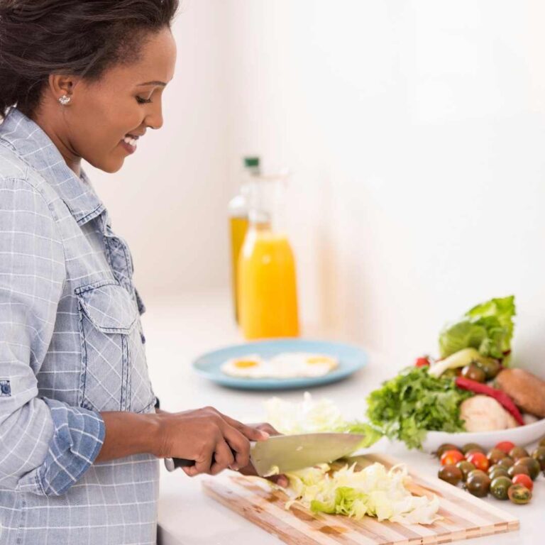 a woman preparing food to eat healthy